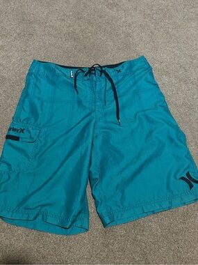 Hurley Men's Teal board shorts. Size 33.